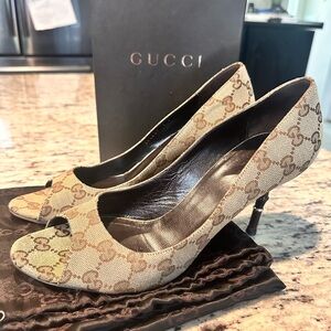 Authentic gently used Gucci logo bamboo heels size 9